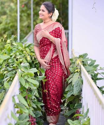 Maroon silk blend jacuard work festival saree with unstitched blouse piece 1