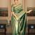 Green silk blend jacuard work festival saree with unstitched blouse piece