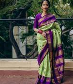 Pista purple silk blend jacuard work festival saree with unstitched blouse piece