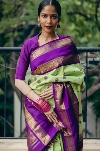 Pista purple silk blend jacuard work festival saree with unstitched blouse piece