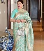 Sky blue silk blend jacuard work festival saree with unstitched blouse piece