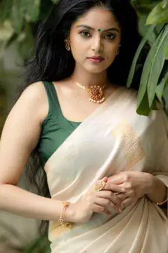 Cream green silk blend jacuard work festival saree with unstitched blouse piece