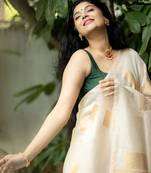 Cream green silk blend jacuard work festival saree with unstitched blouse piece