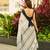 White black silk blend jacuard work festival saree with unstitched blouse piece
