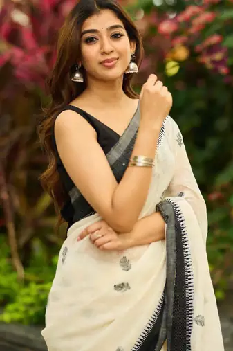 White black silk blend jacuard work festival saree with unstitched blouse piece