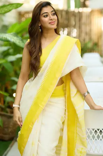 White black silk blend jacuard work festival saree with unstitched blouse piece