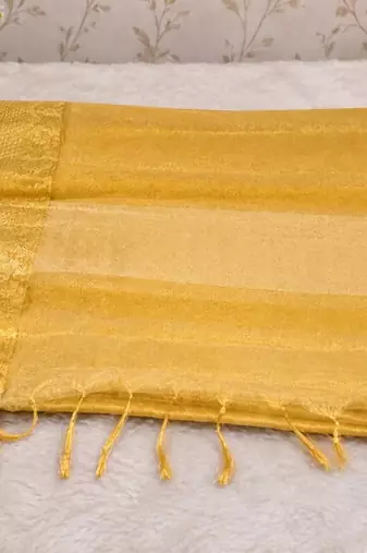 beige zari woven tissue saree with blouse