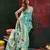 Turquoise blue woven, floral cotton silk paithani saree with blouse