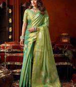 Sea green zari woven tissue traditional saree with blouse