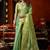 Sea green zari woven tissue traditional saree with blouse
