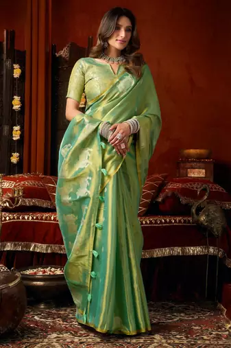Sea green zari woven tissue traditional saree with blouse