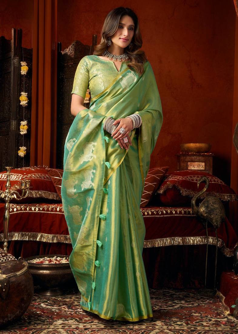 Sea green zari woven tissue traditional saree with blouse