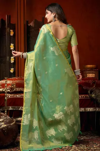 Sea green zari woven tissue traditional saree with blouse