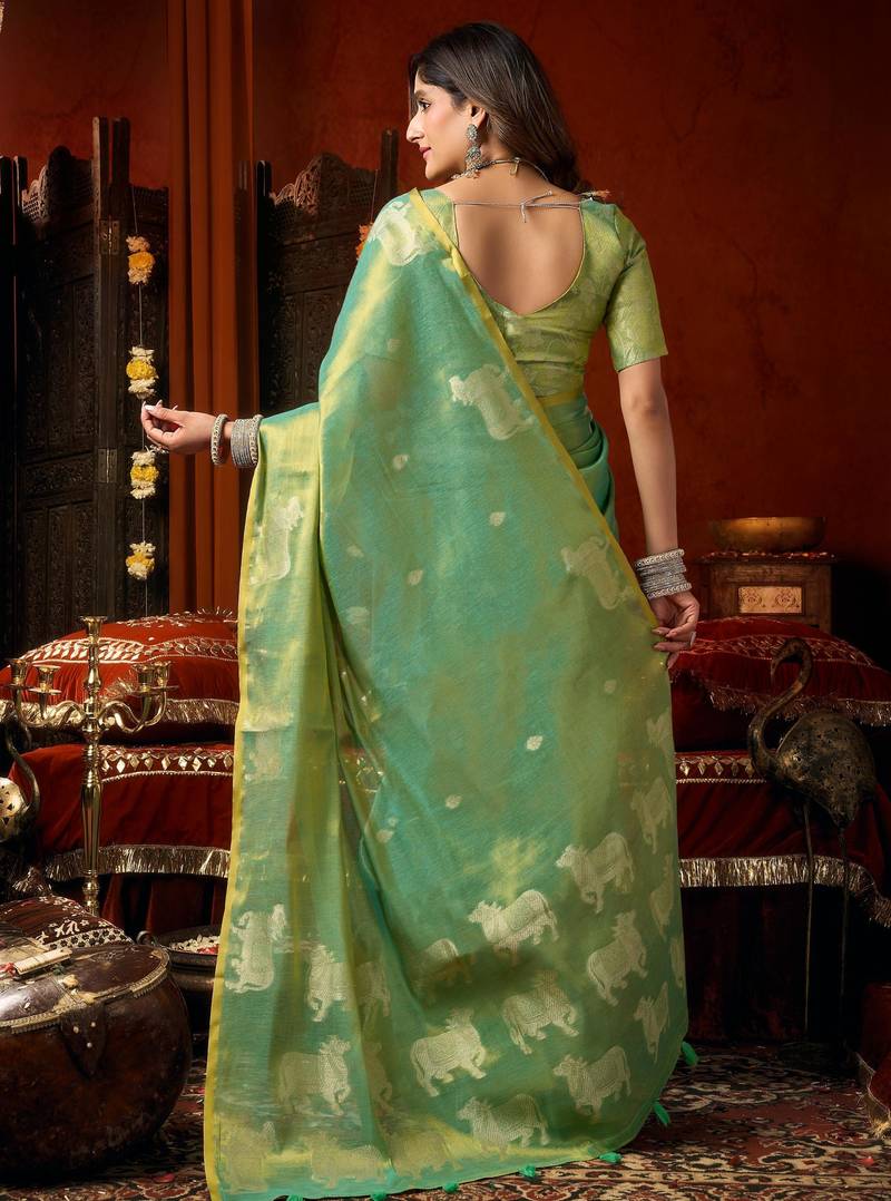 Sea green zari woven tissue traditional saree with blouse