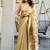beige zari woven cotton blend jacquard traditional saree with blouse