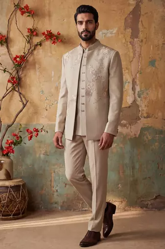 Heavy lachaka 3-piece short jodhpuri featuring intricate handwork, cotton lining, and a luxurious designer finish.