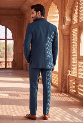 Heavy lachaka 3-piece short jodhpuri featuring intricate handwork, cotton lining, and a luxurious designer finish. 2