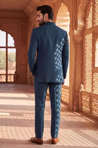 Heavy lachaka 3-piece short jodhpuri featuring intricate handwork, cotton lining, and a luxurious designer finish.