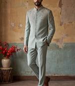 Heavy lachaka 3-piece short jodhpuri featuring intricate handwork, cotton lining, and a luxurious designer finish.