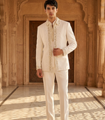 Heavy lachaka 3-piece short jodhpuri featuring intricate handwork, cotton lining, and a luxurious designer finish.