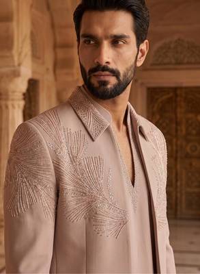 Heavy lachaka 3-piece short jodhpuri featuring intricate handwork, cotton lining, and a luxurious designer finish. 2