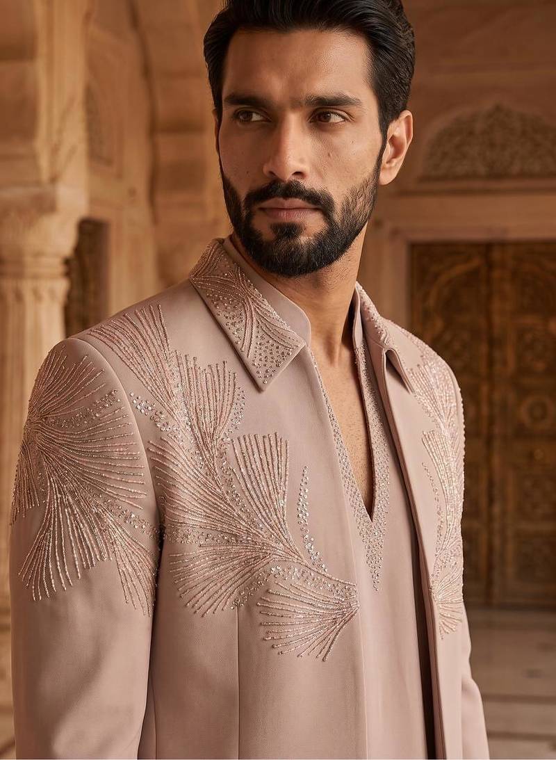 Heavy lachaka 3-piece short jodhpuri featuring intricate handwork, cotton lining, and a luxurious designer finish.