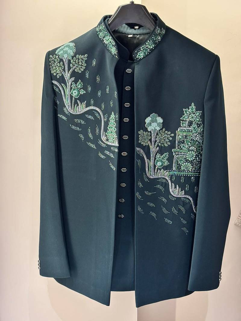 Heavy lachaka 3-piece short jodhpuri featuring intricate handwork, cotton lining, and a luxurious designer finish.