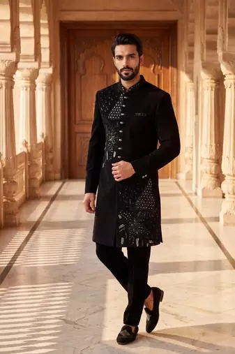 Heavy lachaka 2-piece long jodhpuri featuring intricate handwork, cotton lining, and a luxurious designer finish.