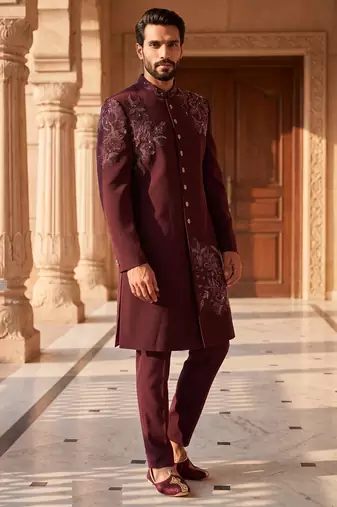 Heavy lachaka 2-piece long jodhpuri featuring intricate handwork, cotton lining, and a luxurious designer finish.