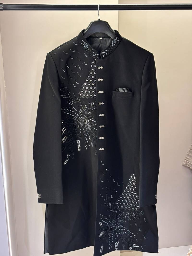 Heavy lachaka 2-piece long jodhpuri featuring intricate handwork, cotton lining, and a luxurious designer finish.