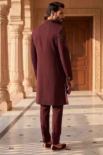 Heavy lachaka 2-piece long jodhpuri featuring intricate handwork, cotton lining, and a luxurious designer finish.