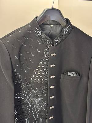 Heavy lachaka 2-piece long jodhpuri featuring intricate handwork, cotton lining, and a luxurious designer finish. 5