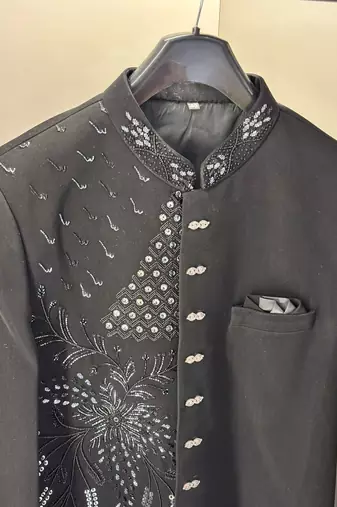 Heavy lachaka 2-piece long jodhpuri featuring intricate handwork, cotton lining, and a luxurious designer finish.