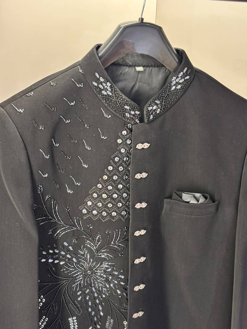 Heavy lachaka 2-piece long jodhpuri featuring intricate handwork, cotton lining, and a luxurious designer finish.