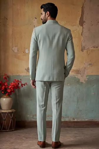 Heavy lachaka 3-piece short jodhpuri featuring intricate handwork, cotton lining, and a luxurious designer finish.