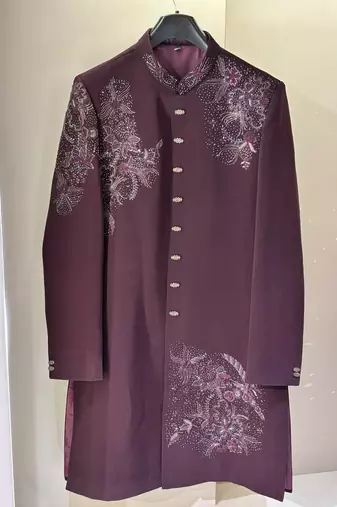 Heavy lachaka 2-piece long jodhpuri featuring intricate handwork, cotton lining, and a luxurious designer finish.