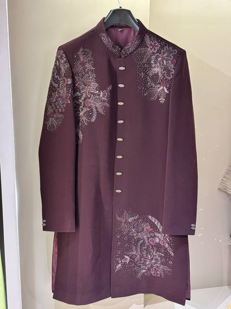Heavy lachaka 2-piece long jodhpuri featuring intricate handwork, cotton lining, and a luxurious designer finish.