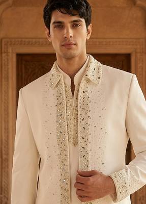 Heavy lachaka 3-piece short jodhpuri featuring intricate handwork, cotton lining, and a luxurious designer finish. 2