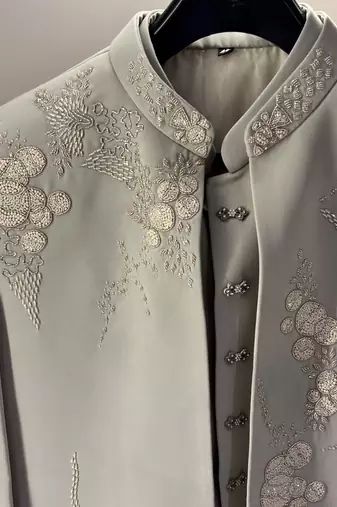 Heavy lachaka 3-piece short jodhpuri featuring intricate handwork, cotton lining, and a luxurious designer finish.
