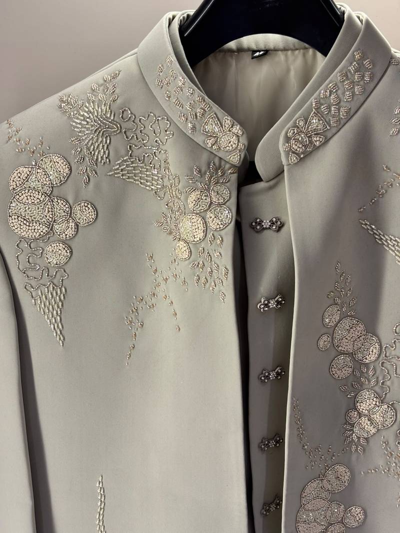 Heavy lachaka 3-piece short jodhpuri featuring intricate handwork, cotton lining, and a luxurious designer finish.