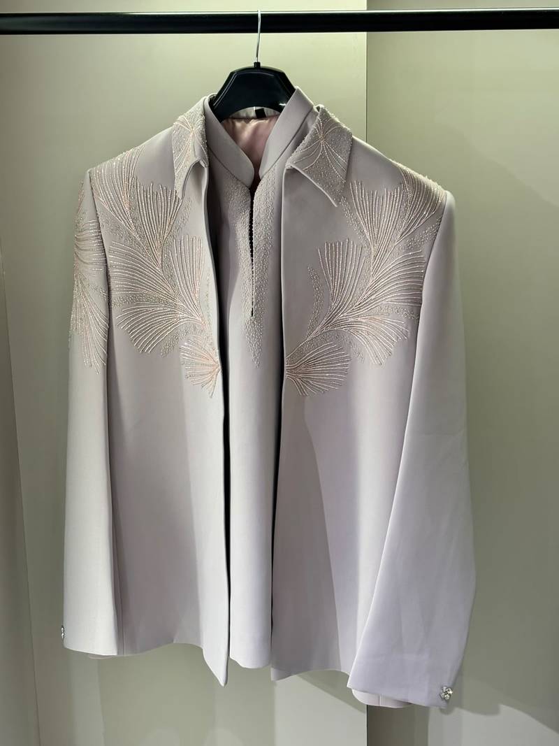 Heavy lachaka 3-piece short jodhpuri featuring intricate handwork, cotton lining, and a luxurious designer finish.