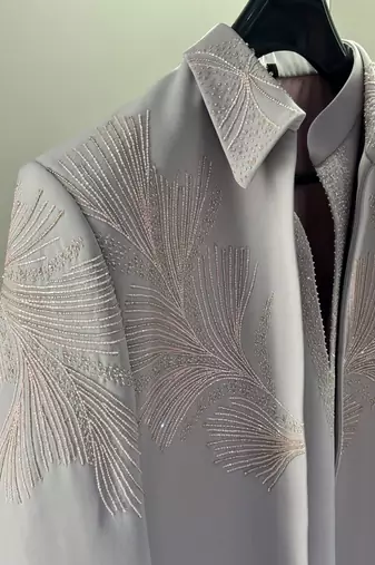 Heavy lachaka 3-piece short jodhpuri featuring intricate handwork, cotton lining, and a luxurious designer finish.