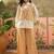 Beige solid cotton stitched layered shirt top with wide-leg trousers co-ord set