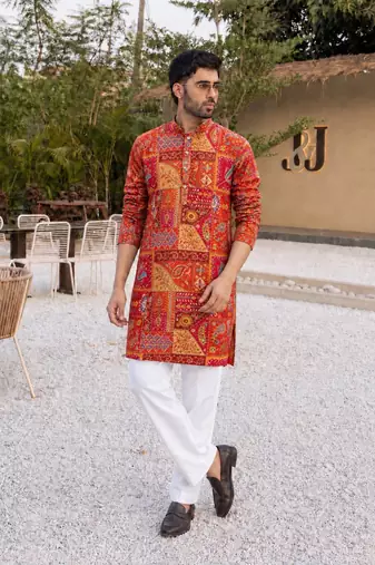 ORANGE CREPE SILK PARTY WEAR KURTA AND PAYJAMA