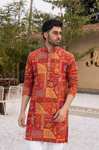 ORANGE CREPE SILK PARTY WEAR KURTA AND PAYJAMA
