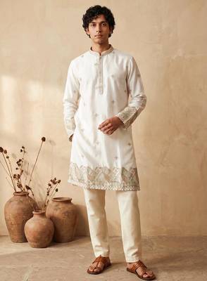 White silk embroidered kurta with cream pajama     elegant party wear look 1