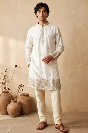 White silk embroidered kurta with cream pajama     elegant party wear look