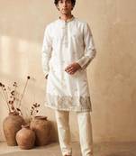White silk embroidered kurta with cream pajama     elegant party wear look