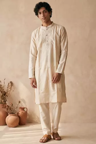 Cream silk embroidered kurta with cream pajama     elegant party wear look