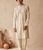 Cream silk embroidered kurta with cream pajama     elegant party wear look